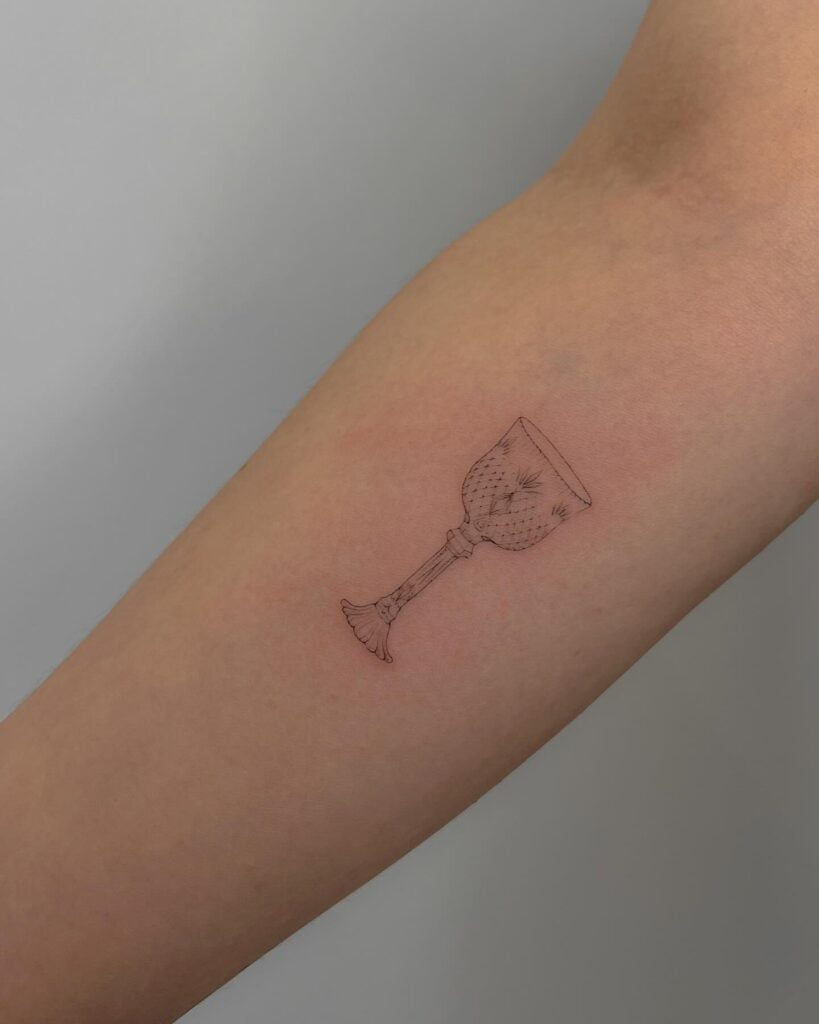 Pretty Chalice Crystal Glass Tattoo in Fineline on the Forearm: Crystal Clarity