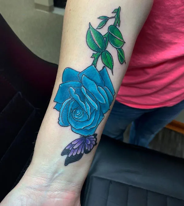 Purple butterfly hand tattoo