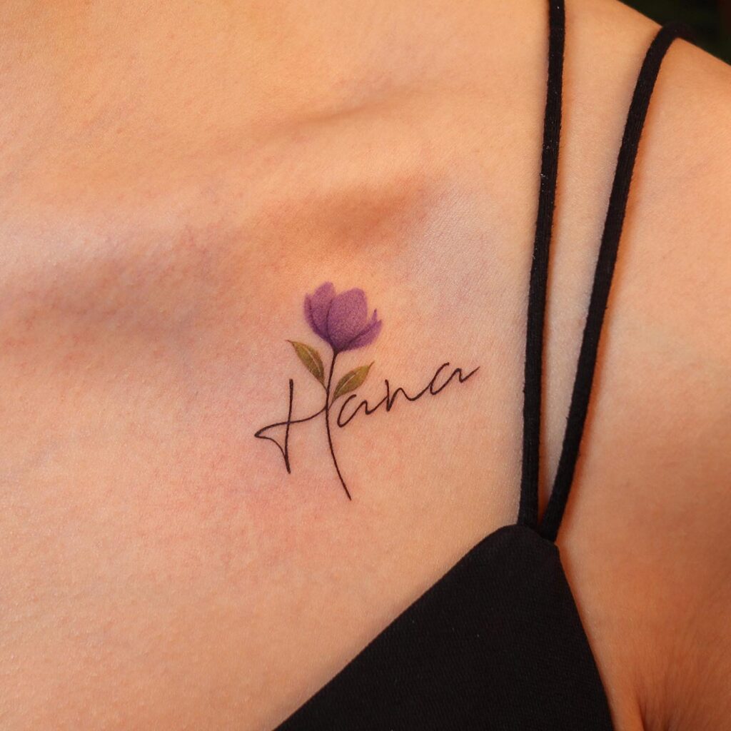 Purple flower and elegant "hana" name tattoo on the collarbone for a personal touch "hana" blooms