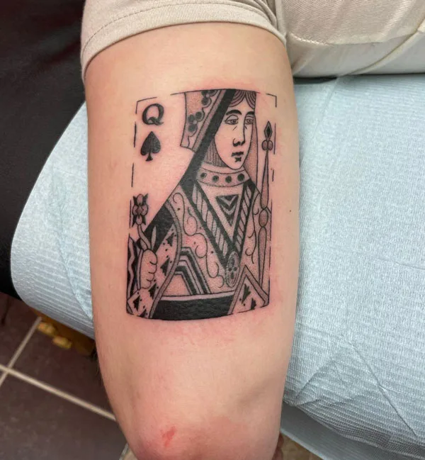 Queen of spade arm tattoo