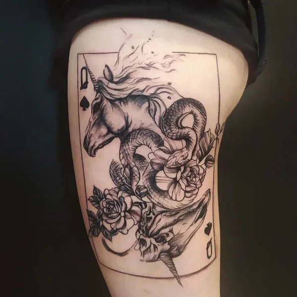 Queen of spade thigh tattoo