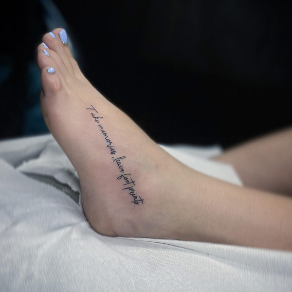 Quote tattoo on foot