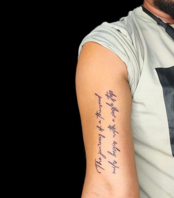 Quotes tattoo on arm