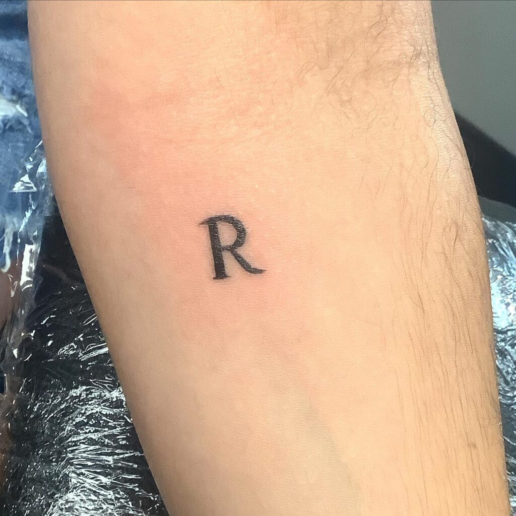 'R' Letter Tattoo Adding Flair to the Forearm: Forearm Finery