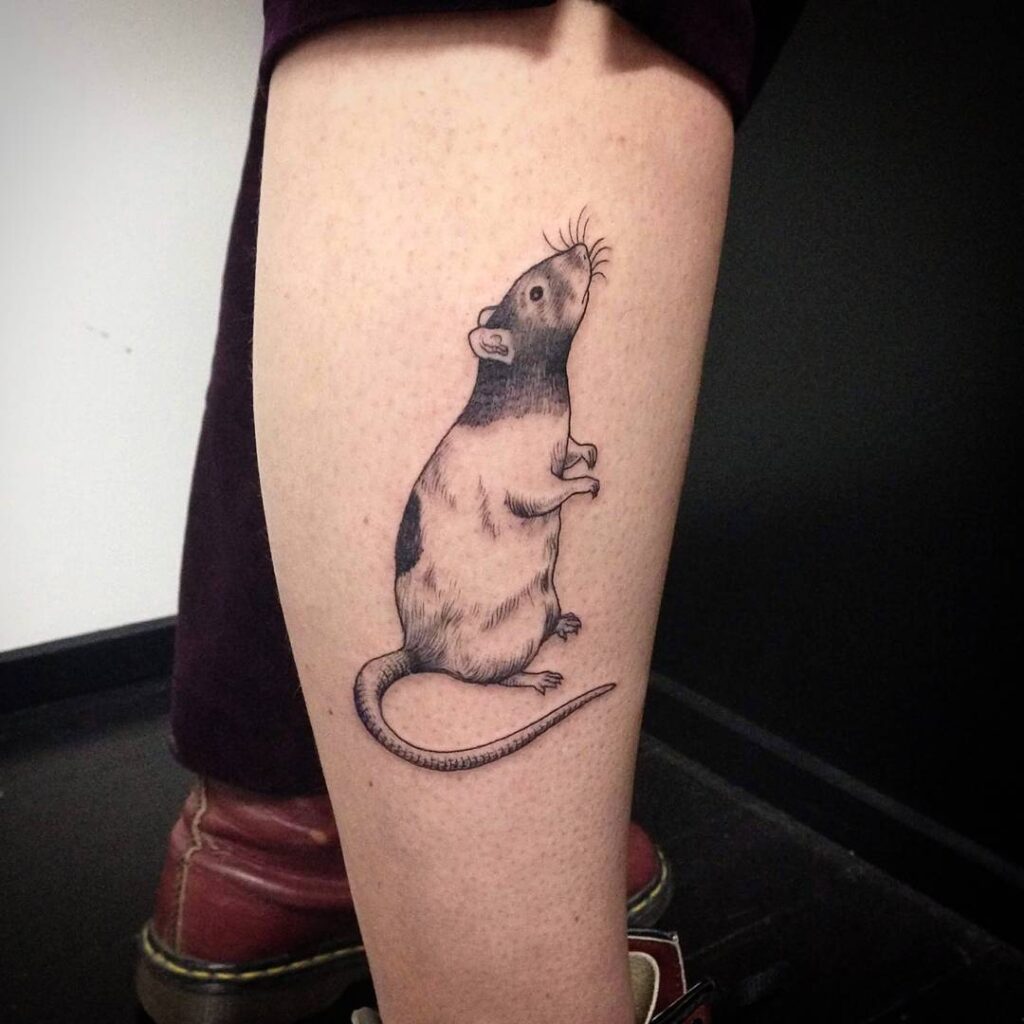 Rat Tattoo with Detailed Features on the Calf: Rodent Royalty 