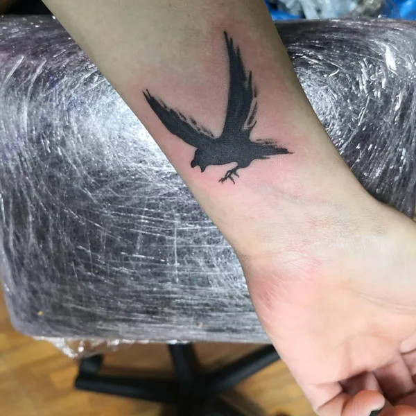 Raven Wrist Tattoo