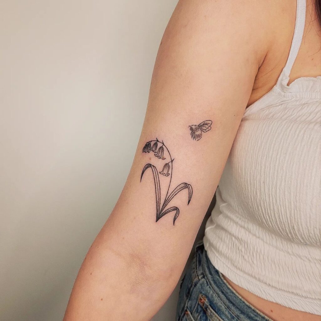 Realistic Bluebell Flower and Bee Tattoo on the Arm for Girls