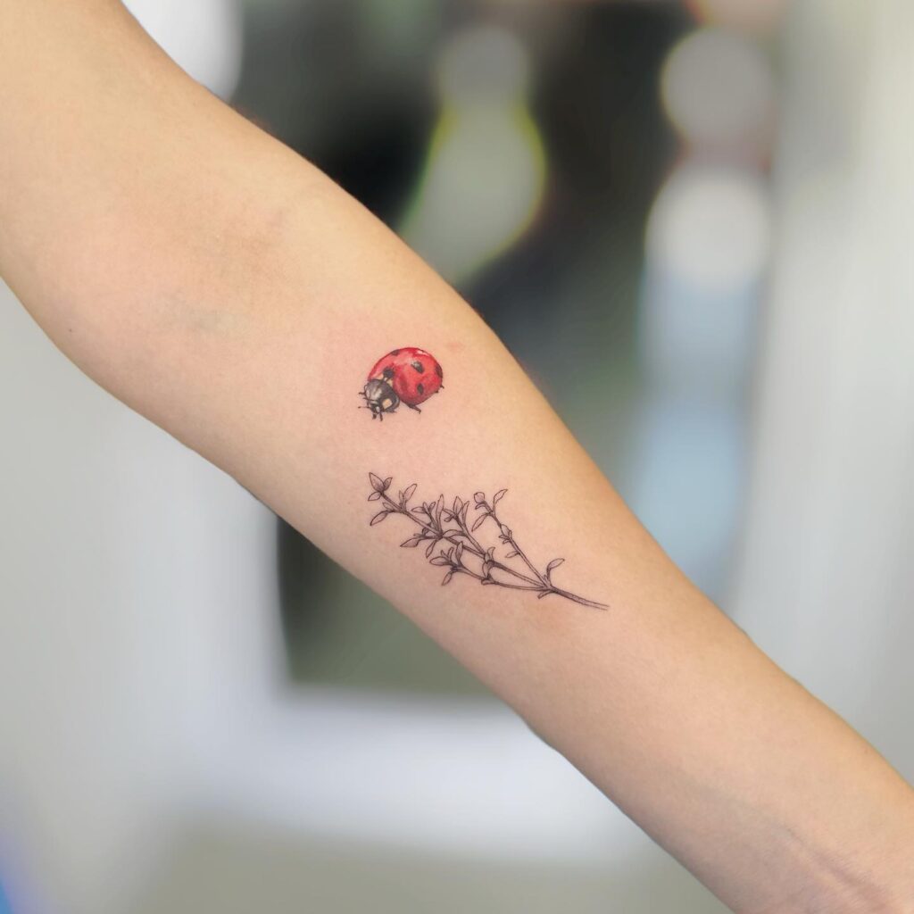 Realistic Ladybug with Flower Tattoo Designs Forearm Beauty