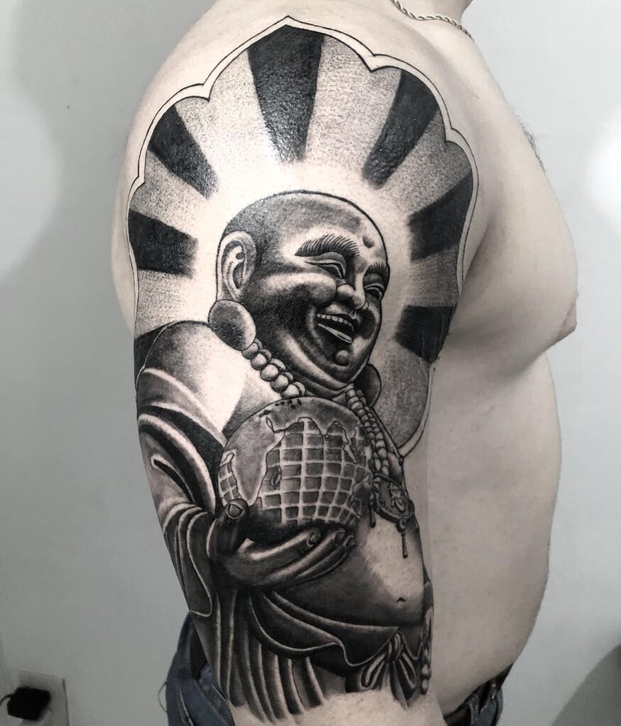 Realistic Laughing Buddha Upper Arm Tattoo for Men Detailed Artistry and Joyful Symbolism 