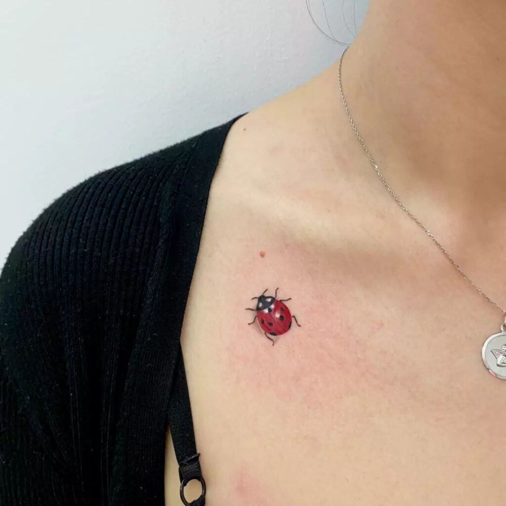 Realistic Minimalist Ladybug Tattoo: Shoulder Art for Girls