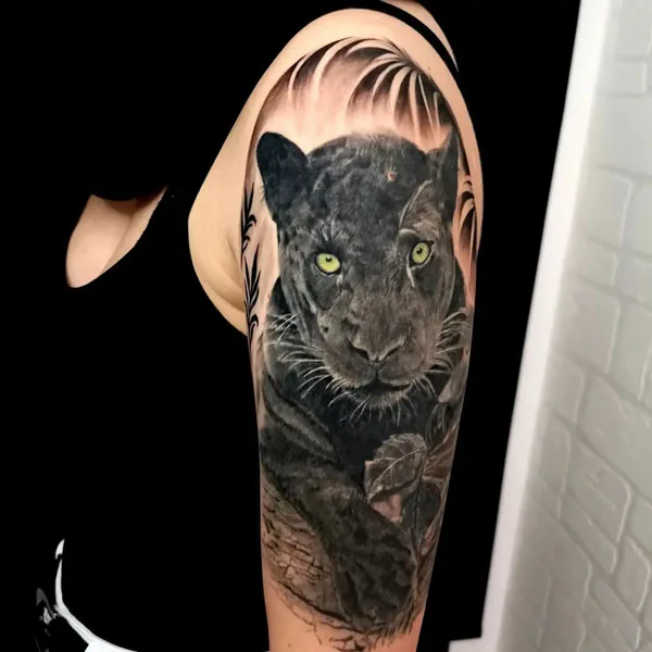 Realistic black panther tattoo