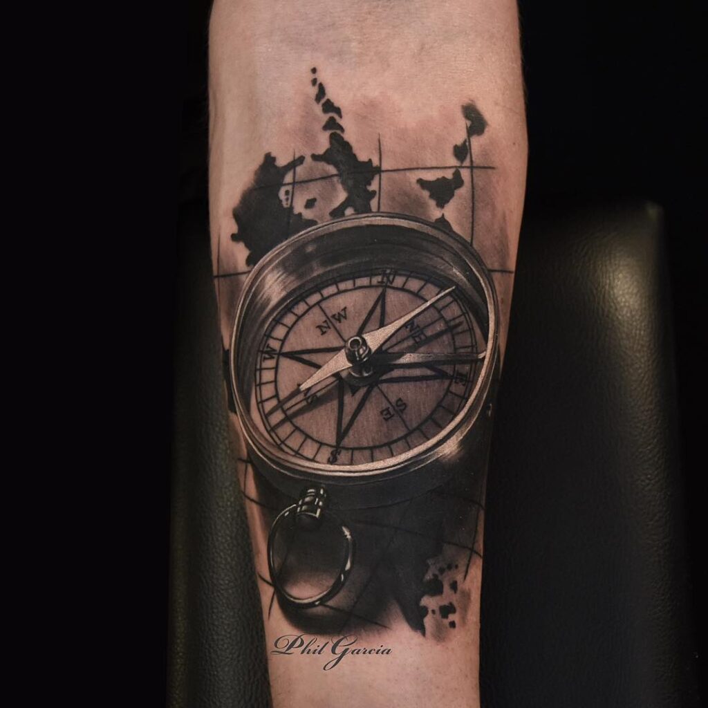 Realistic compass half sleeve tattoo navigating life's journey with ink