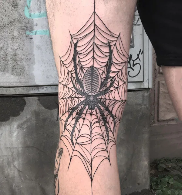 Realistic spider web tattoo