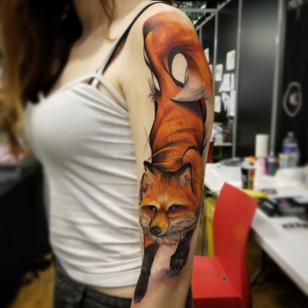 Realistic watercolor fox half sleeve true-to-nature hues on display