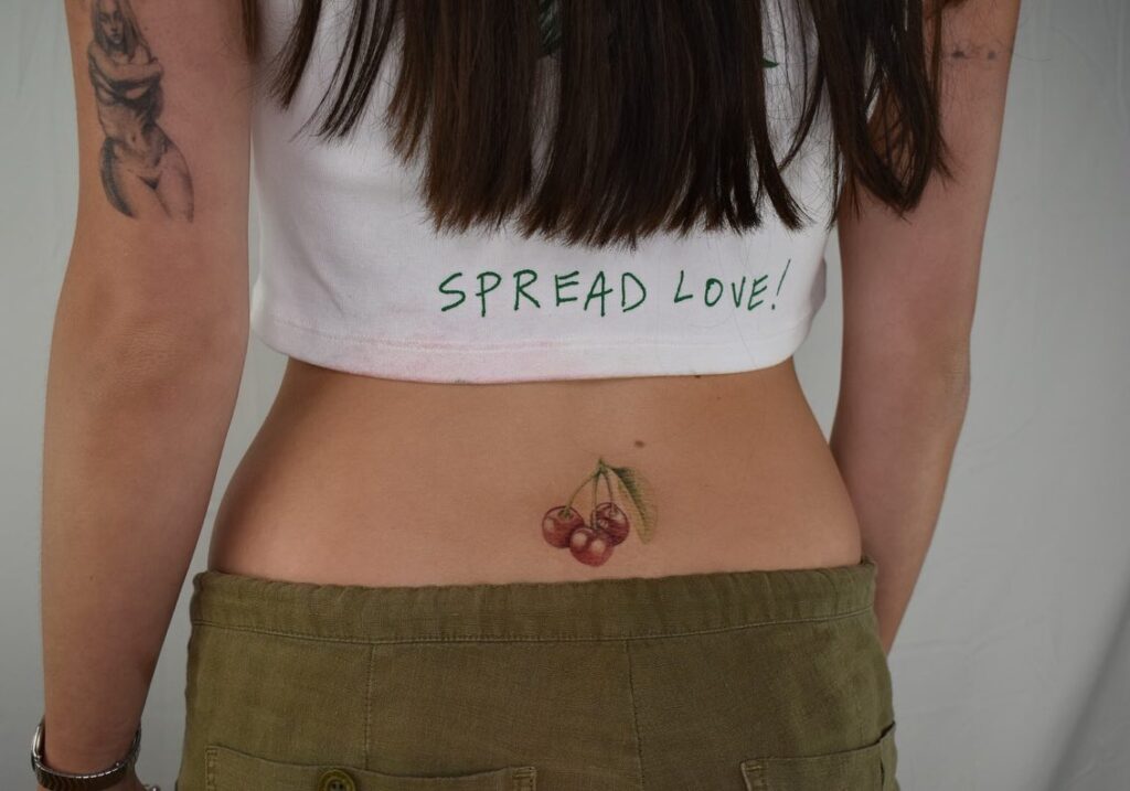 Red Color Cherries Tattoo, a Splash of Sweetness on the Lower Back: Fruity Allure