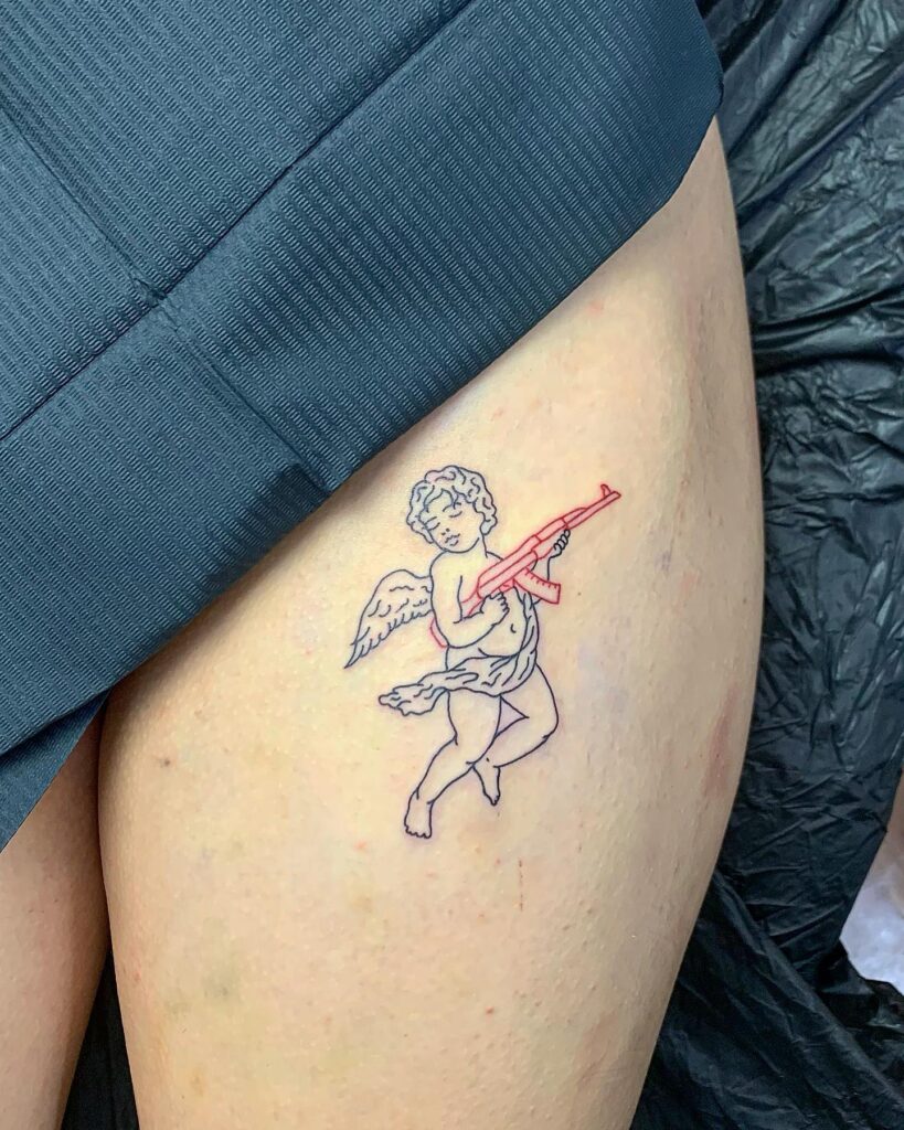 Red Outline Angel with AK47 Gun Tattoo on the Thigh: Revolutionary Seraph
