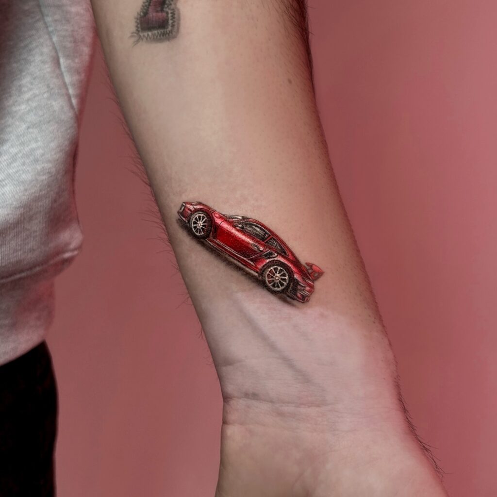 Red Porsche 911 GT3 RS Tattoo with 3D Effect on Inner Forearm Near Wrist