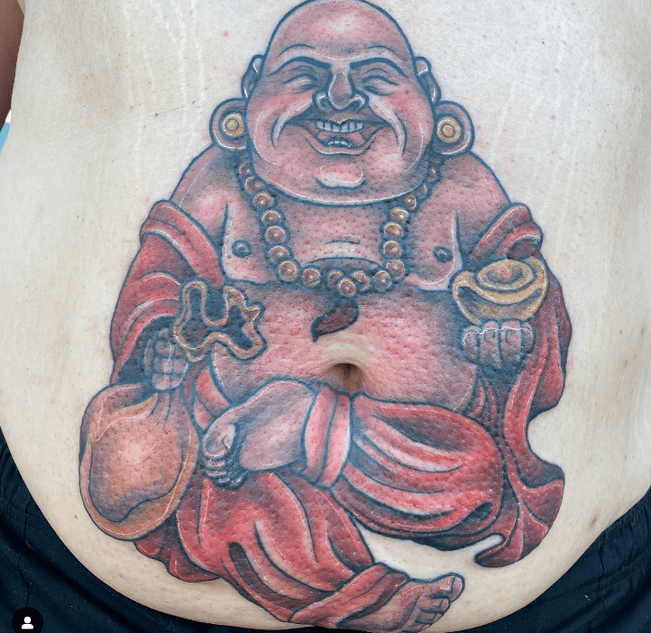 Red Themed Seated Posture Laughing Buddha Tattoo