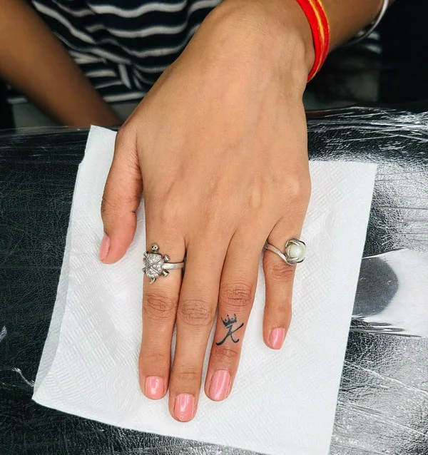 Ring Finger Initial Tattoo 1