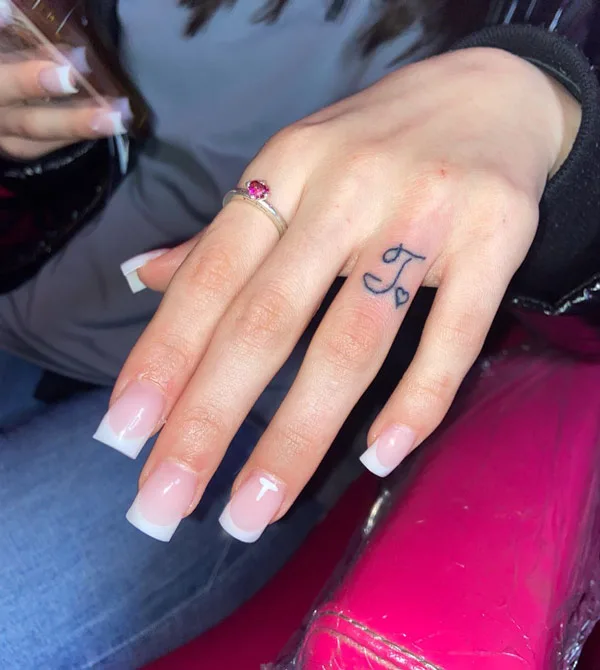 Ring Finger Initial Tattoo 2
