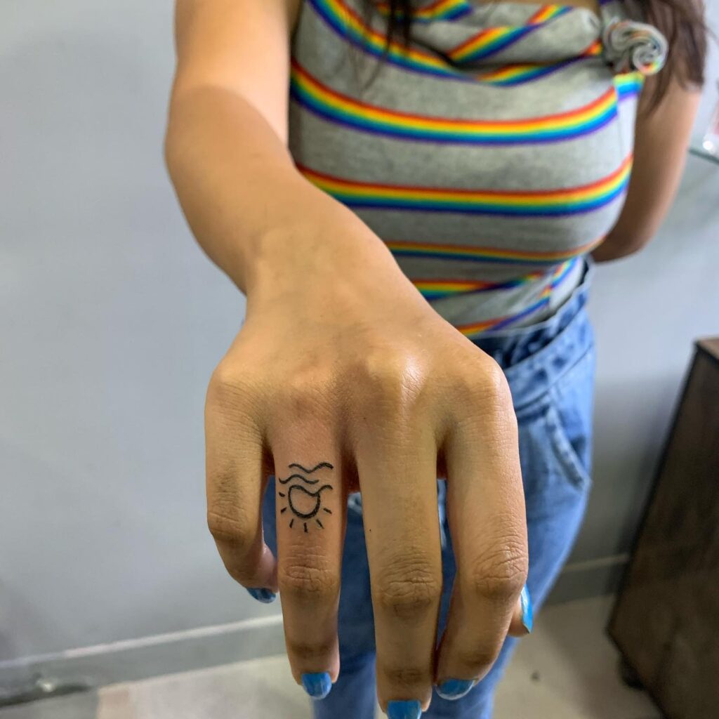 Ring Tattoo Of Sun And Wave For Finger