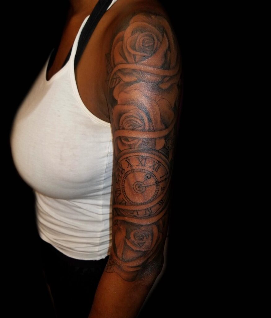 Rose and clock half sleeve tattoo timeless beauty for women