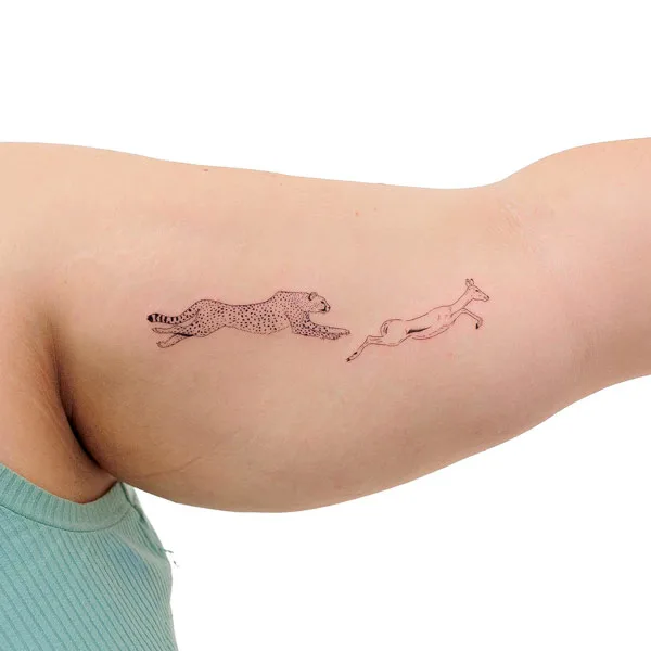 Running cheetah tattoo