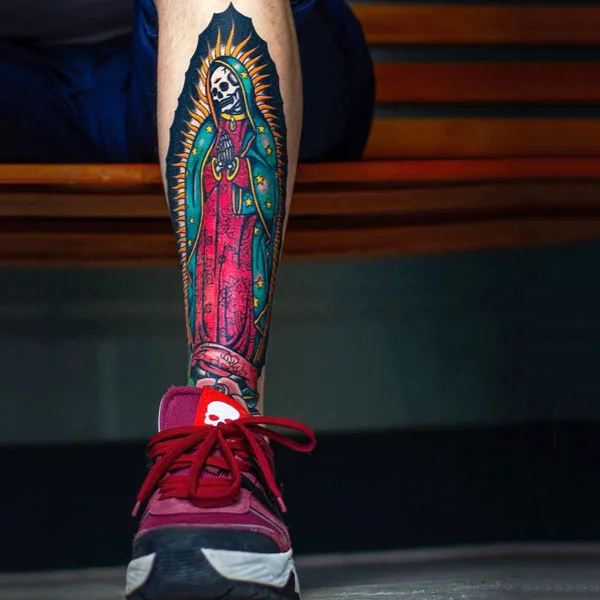 Santa muerte leg tattoo