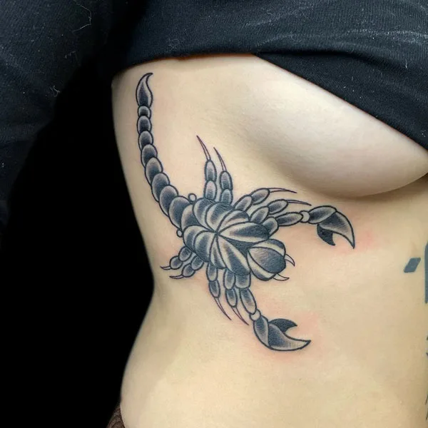Scorpion side boob tattoo