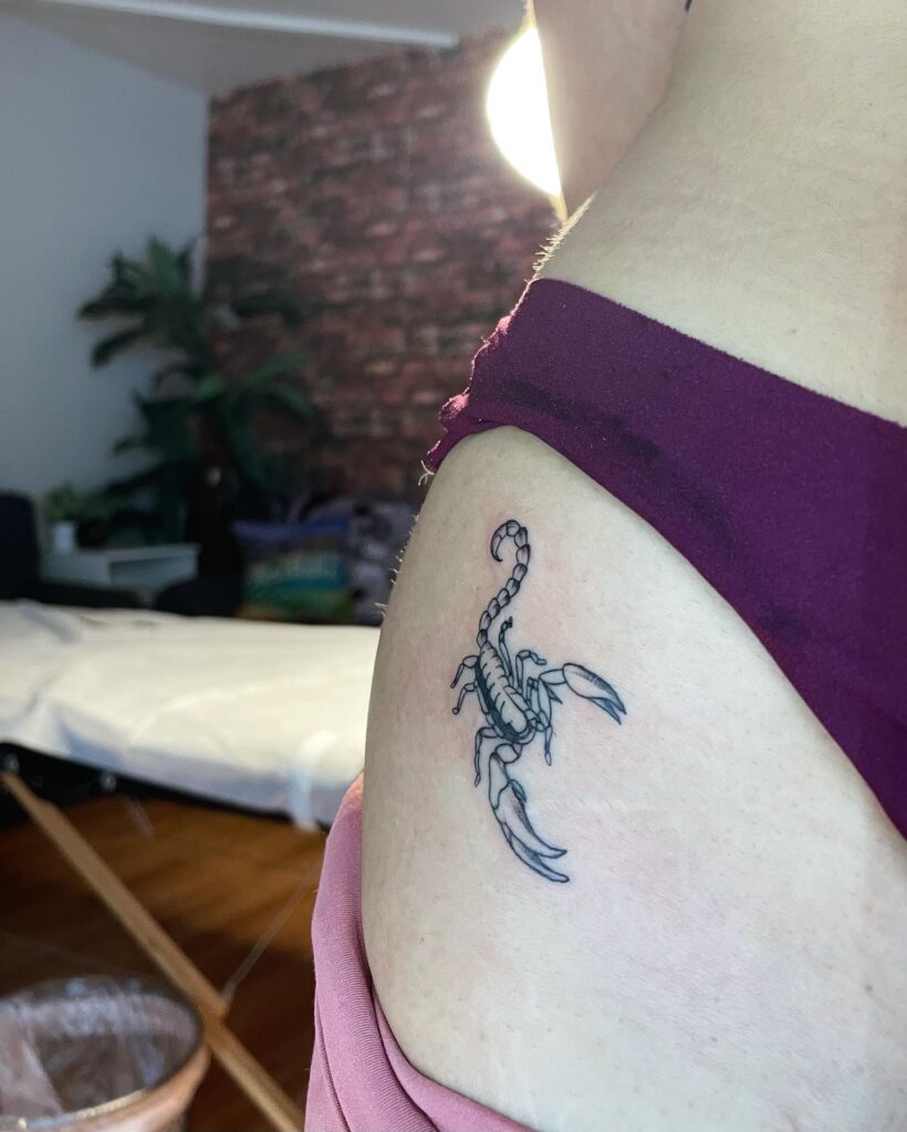 Scorpion Tattoo on the Hip, a Zodiac-inspired Emblem of Intensity: Scorpio's Sting