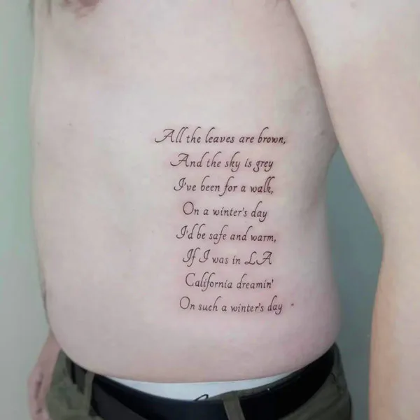 Script Rib Tattoo