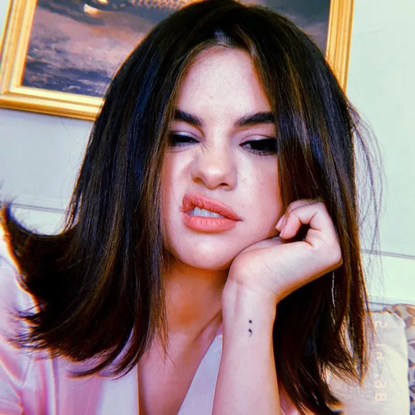 Selena Gomez semicolon tattoo