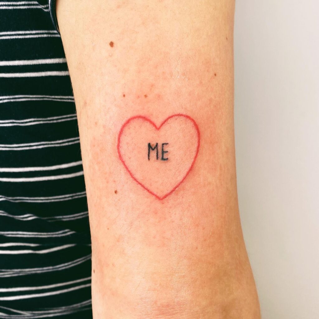 Self love outline red heart with me text tattoo