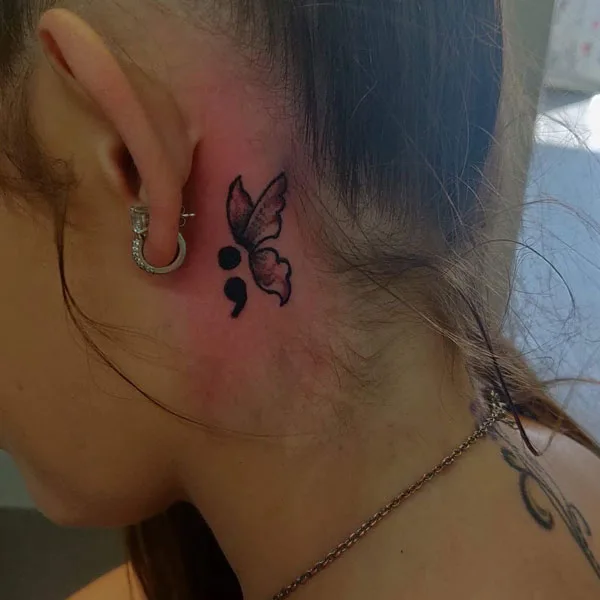 Semicolon butterfly tattoo behind ear
