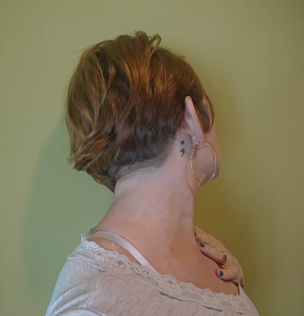 Semicolon Tattoo Behind the Ear: Bold Statement