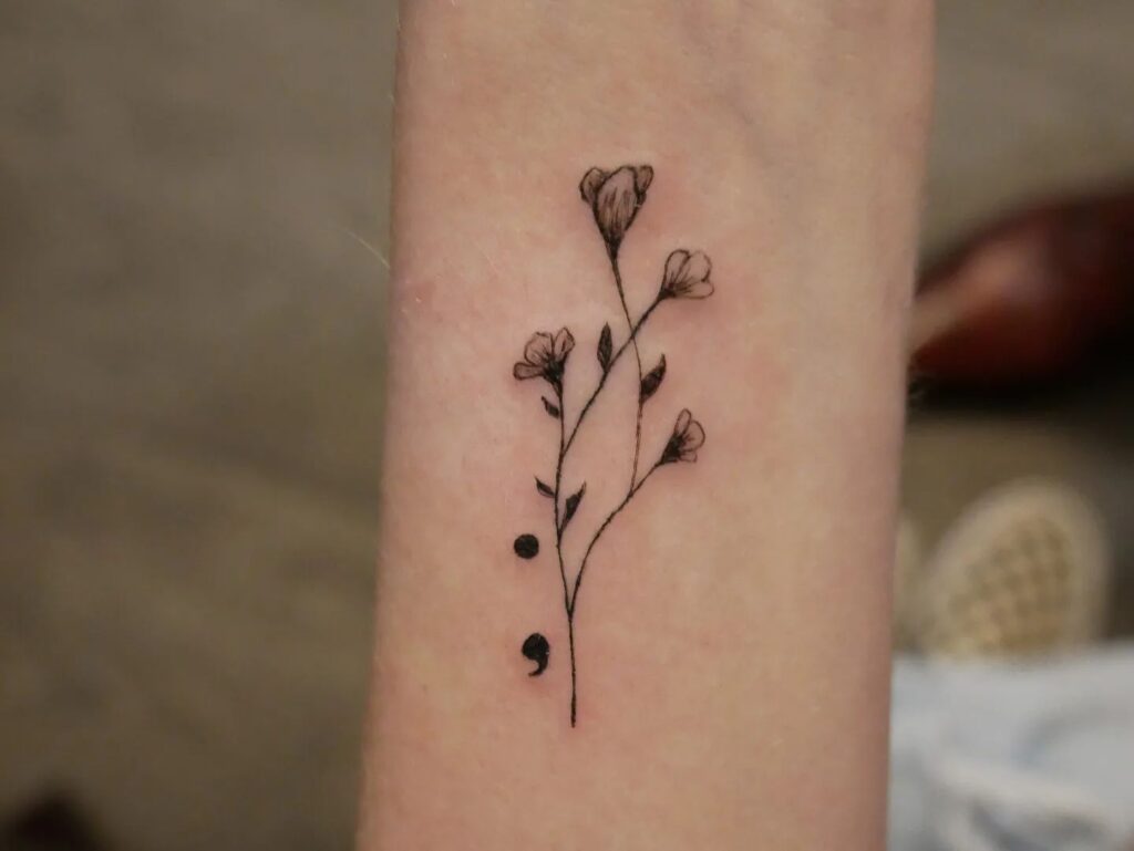 Semicolon Tattoo with Flowers on the Inner Forearm: Floral Connection