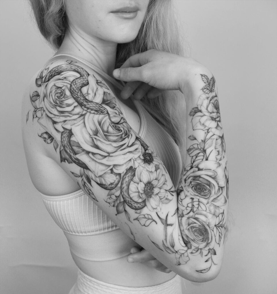 Serene fusion snake, sunflower, and rose tattoo for arm sleeve