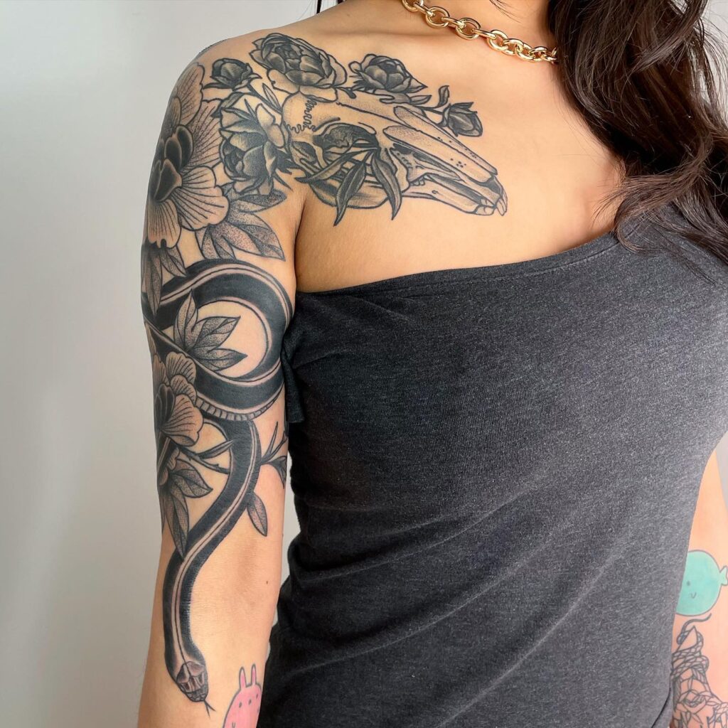 Serpentine Reverie: A Queer-Inclusive Snake Tattoo Sleeve for Women