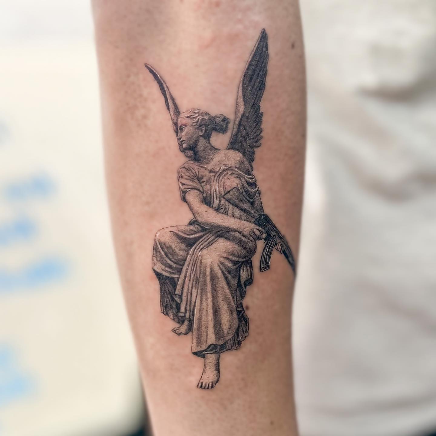 Shaded angel with ak-47 gun tattoo with image Shaded angel with ak-47 gun tattoo with image