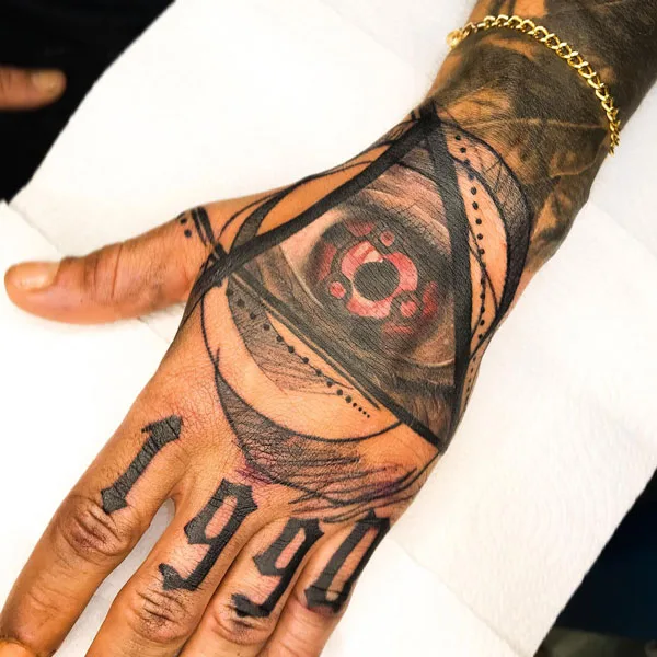 Sharingan hand tattoo