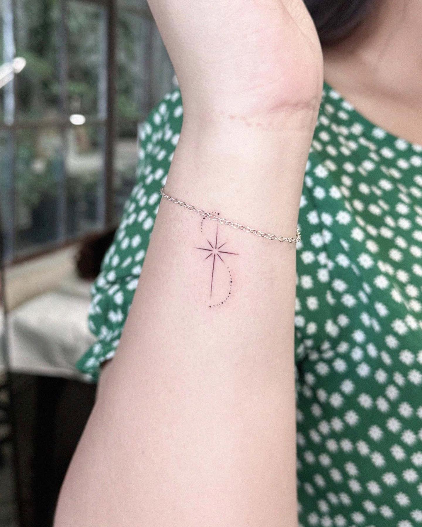 Shooting Star Wrist Tattoo Minimalist Celestial Design with Dotted Curve