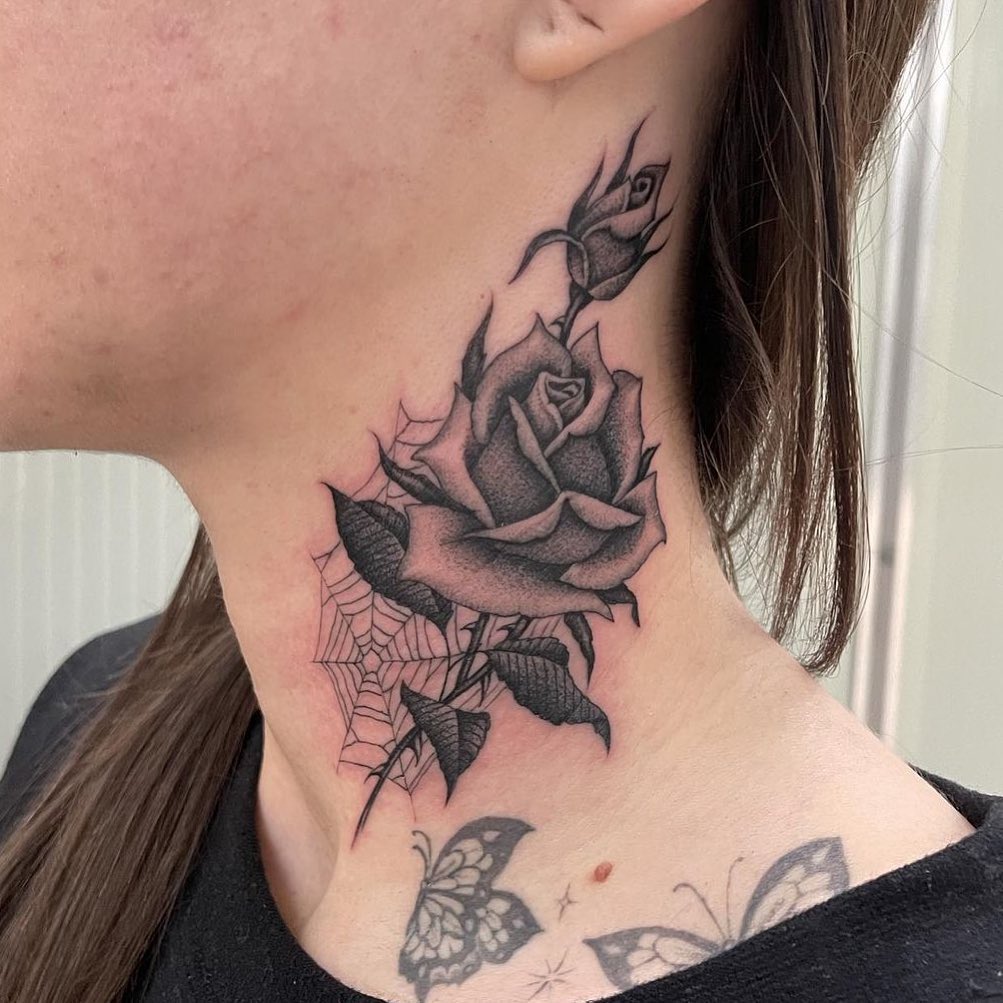 Side neck tattoos for women roses butterflies and spider webs