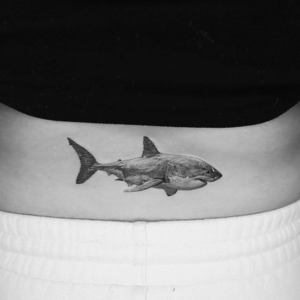 Side View Shark Tattoo on the Lower Back: Subtle Strength