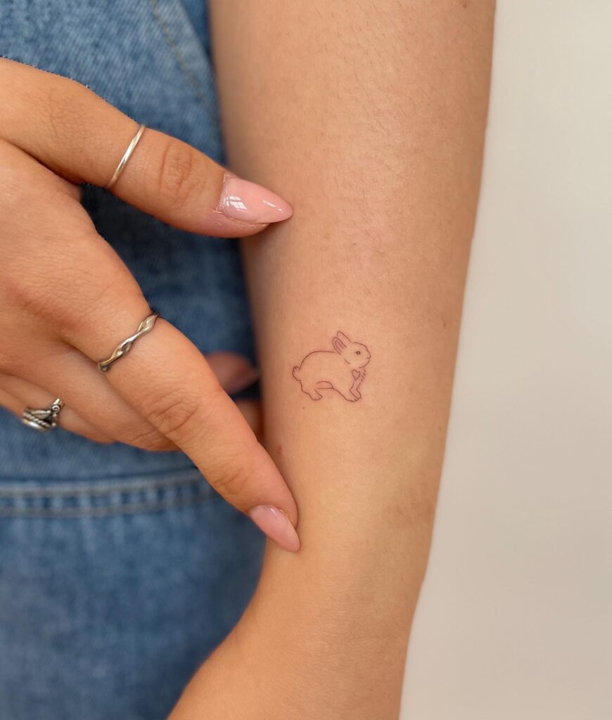 Side View Tattoo on the Wrist's Side: Whimsical Rabbit Outline