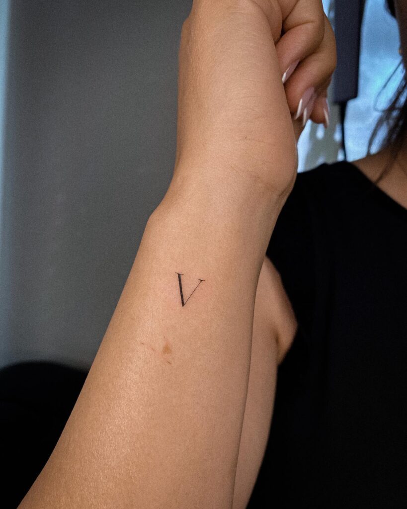 Side Wrist Letter 'V' Tattoo for Women: Feminine Touch