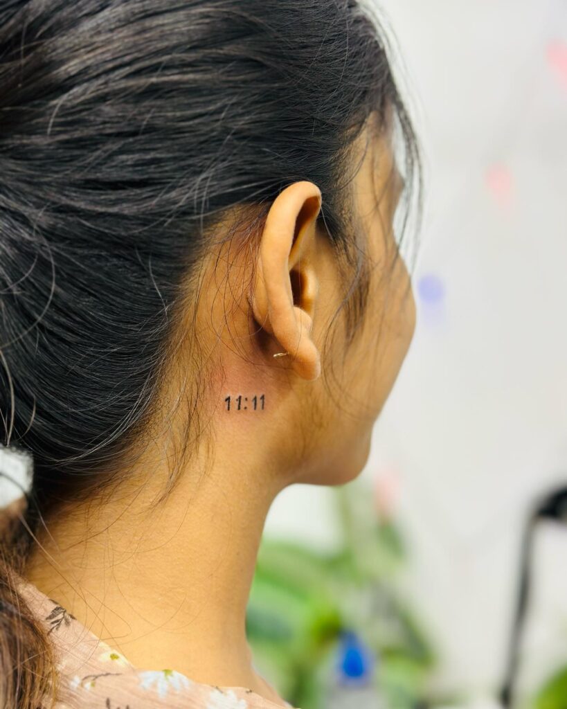Simple '1111' tattoo, perfectly placed behind the ear or on the side of the neck timeless significance