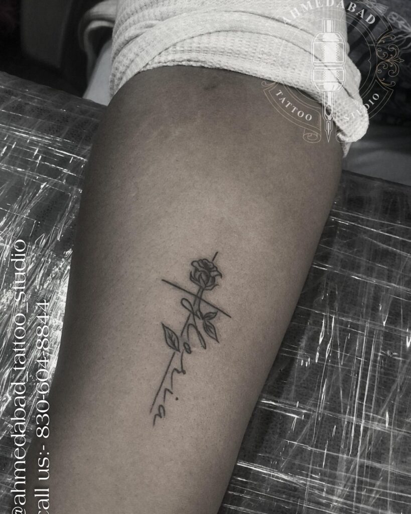 Simple Outline Cross with Roses Tattoo Embracing Simplicity and Meaning