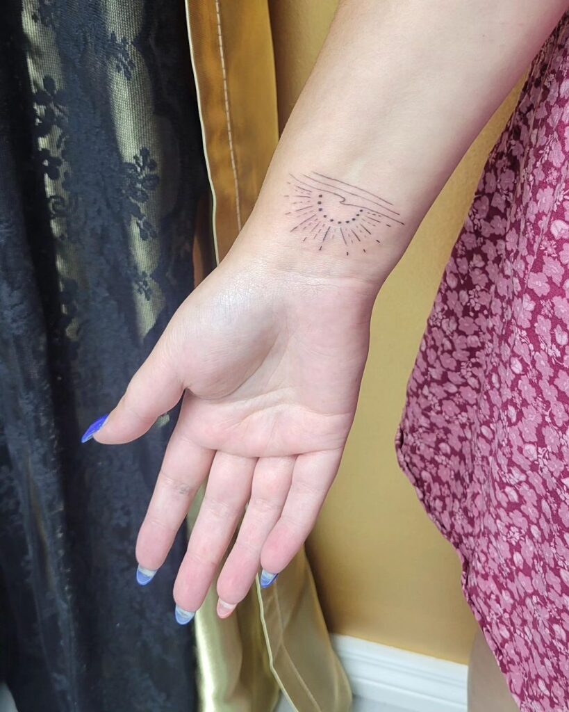 Simple Sun and Wave Tattoo on Wrist for Women Power of Nature