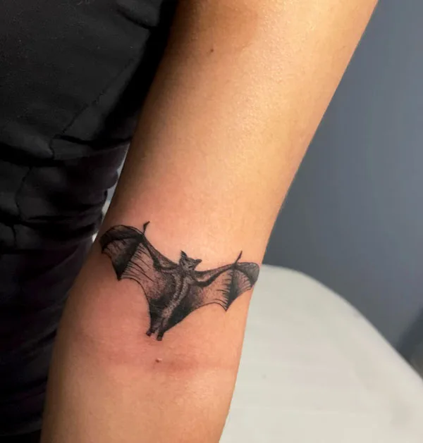 Simple bat tattoo