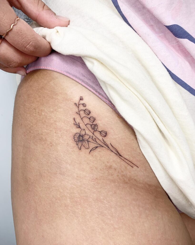 Simple Cute Little Flower Tattoo on the Hip: Petite Blossoms
